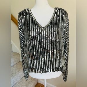 Nolan Miller Dynasty Collection sequined v-neck top. Size 4/6 with loose fit.